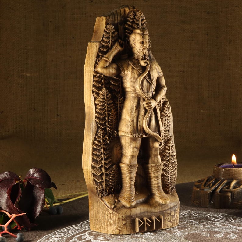 May include: A wooden carving of a Norse god, possibly Odin, with a beard and holding a bow and arrow. The carving is surrounded by a carved forest scene and the word "FEHU" is carved at the bottom.