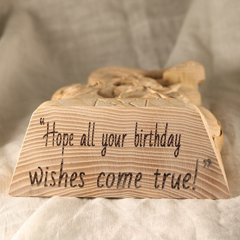 May include: Wooden birthday gift with the message "Hope all your birthday wishes come true!" engraved on the front.