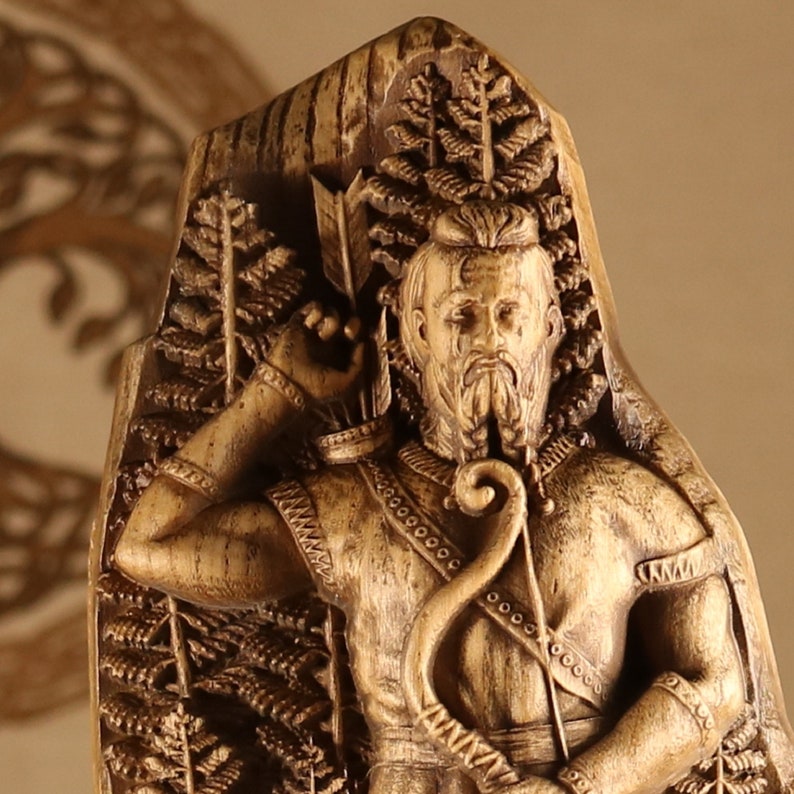 May include: A wooden sculpture of a warrior with a bow and arrow. The warrior is wearing a helmet and armor, and has a beard. The sculpture is carved in a detailed style, with intricate details on the armor and the warrior's face.