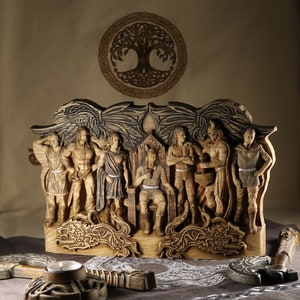 May include: A wooden wall hanging featuring a group of carved figures, including a king on a throne, surrounded by warriors and a tree of life design. The figures are intricately detailed and have a rustic, aged appearance.