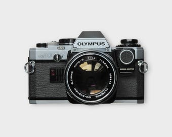 Olympus OM-2 35mm Film Camera W/ 50mm F1.8 Zuiko Lens