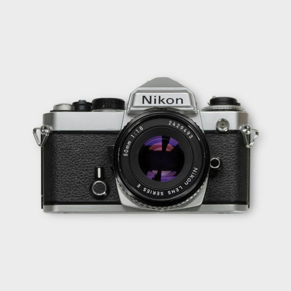 Appareil Photo Argentique Nikon FE Argent - Boîtier SLR 35mm Monture F, D'occasion Fonctionnel