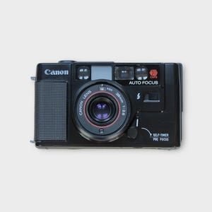 Cámara de película Canon AF35M de 35 mm: una cámara compacta clásica
