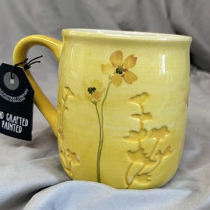 The Old Pottery Company Yellow Floral Embossed Ceramic Mug