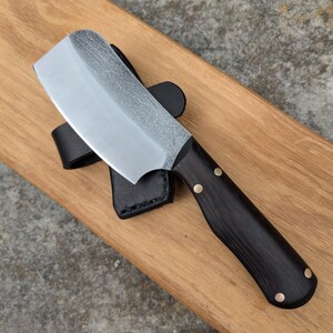 Handmade 17 cm fulltang cleaver with Wenge Wood handle and leather sheath.