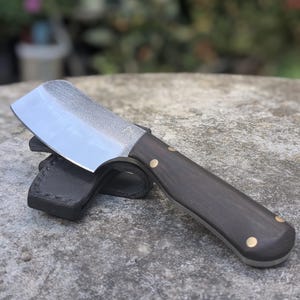 Handmade 17 cm fulltang cleaver with Wenge Wood handle and leather sheath.