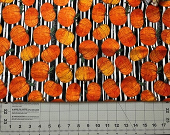 Striped Pumpkin fabric. 100% quilters cotton. SOLD BY 1/2 yard. Multiple purchases in same order will be cut in a continuous piece.