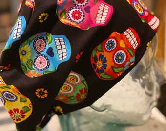 Multi colored sugar skull scrub hat