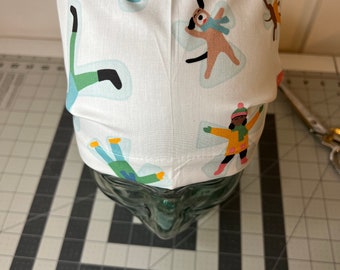 Snow angels euro style scrub, chemo hat.