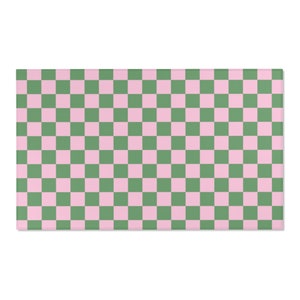 Puede incluir: Una alfombra de patr&oacute;n a cuadros con cuadrados alternos de rosa y verde.