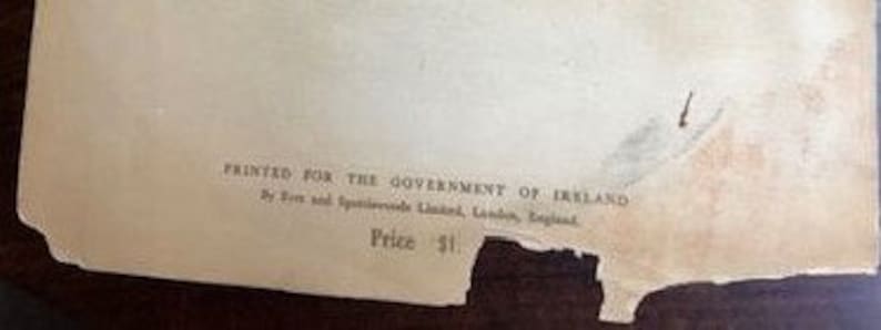 May include: A close-up of a page from a book with the text "Printed for the Government of Ireland" and "Price 1s".