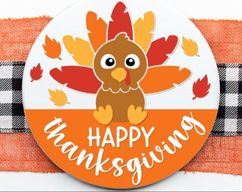 May include: A round orange and white Thanksgiving sign with a cartoon turkey and the text "Happy Thanksgiving".