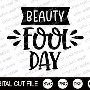 Op de afbeelding: Zwart-wit digitaal snijbestand ontwerp dat "Beauty Fool Day" zegt. Het ontwerp is beschikbaar in de formaten SVG, PNG, DXF en EPS.