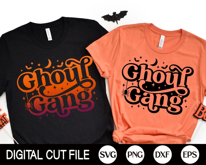 May include: Two t-shirts with the text "Ghoul Gang" in a retro font. The shirts are black and orange with a spider and stars graphic.