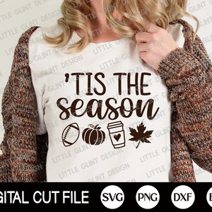 May include: A white t-shirt featuring the text "'Tis the Season" in dark brown, with a football, pumpkin, coffee cup with a heart, and a maple leaf. The words "Digital Cut File" are at the bottom of the image.