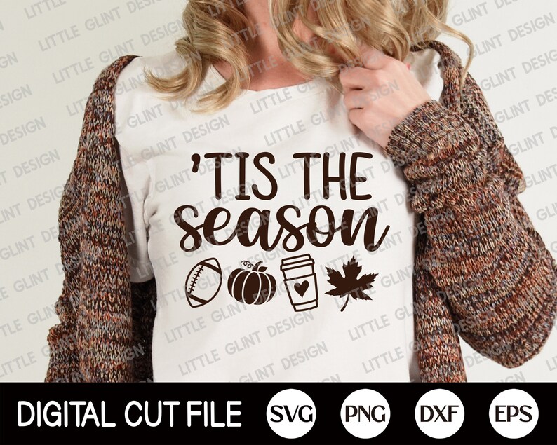 May include: A white t-shirt featuring the text "'Tis the Season" in dark brown, with a football, pumpkin, coffee cup with a heart, and a maple leaf. The words "Digital Cut File" are at the bottom of the image.