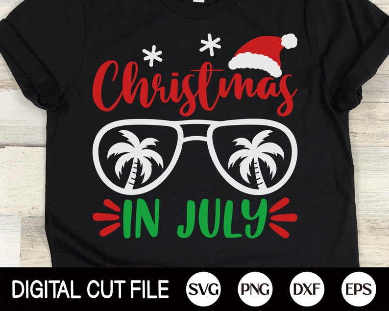 May include: Black t-shirt with white text that says "Christmas in July" and a red Santa hat with sunglasses and palm trees.