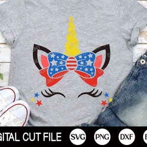 May include: A gray t-shirt with a unicorn design featuring a red, white, and blue bow with stars. The unicorn has a yellow horn and black eyelashes. The text "DIGITAL CUT FILE" is at the bottom of the image, along with the file formats SVG, PNG, DXF, and EPS.