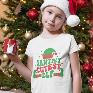 Bump And Beyond Designs Kids Santa's Cutest Elf Shirt - 3/4 Sleeve Raglan For Holidays (12-18 Months, Black) - View #7