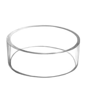 May include: A clear acrylic cake stand with a round base and a cylindrical shape.