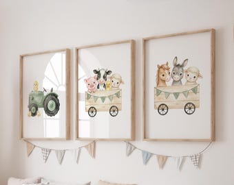 May include: Three framed watercolor prints featuring farm animals and a tractor. The first print shows a green tractor with a yellow chick. The second print depicts a pig, cow, chick, and sheep in a wooden cart. The third print shows a horse, donkey, and sheep in a wooden cart.