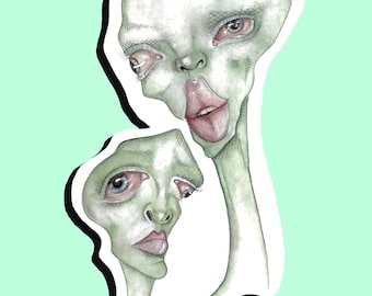 Puede incluir: Una pegatina con una ilustración caprichosa de dos figuras de piel verde con rasgos exagerados. Las figuras tienen ojos grandes, cuellos largos y están conectadas por un solo cuerpo. La pegatina tiene un fondo blanco con un contorno negro.