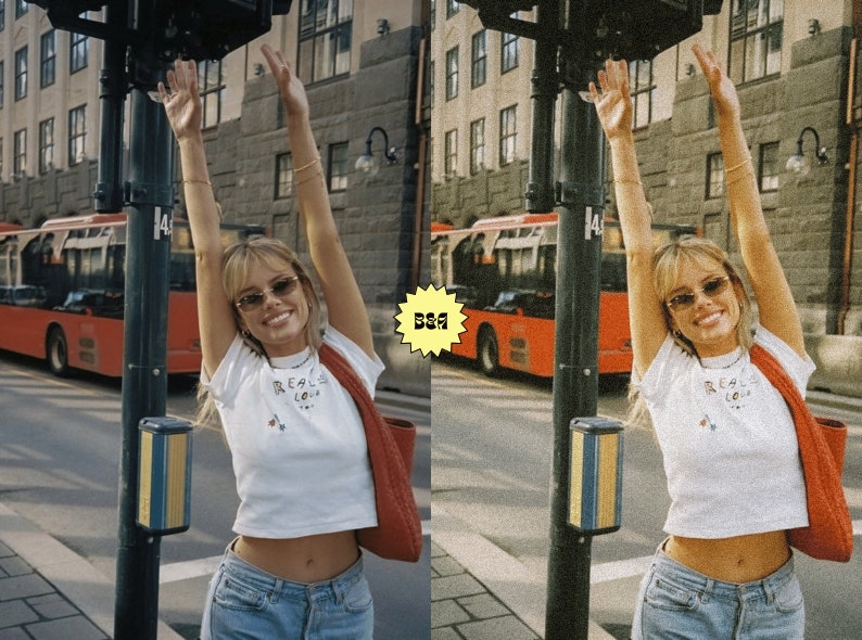 May include: A woman with blonde hair and sunglasses is wearing a white t-shirt with the text "REAL LOVE" and blue jeans. She is standing in front of a red bus and a streetlight with her arms raised in the air.