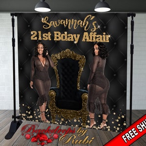 May include: Black and gold backdrop with a gold throne and two women in black dresses. The backdrop has a quilted pattern and the text "Savannah's 21st Bday Affair" in gold glitter. The text "Backdrops by Rubi" is at the bottom of the backdrop.