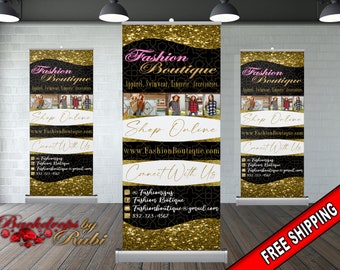 May include: Three black and gold retractable banners with the text "Fashion Boutique" in pink and white. The banners advertise apparel, swimwear, lingerie, and accessories. The banners also include the text "Shop Online" and "Connect With Us" along with a website address and contact information.