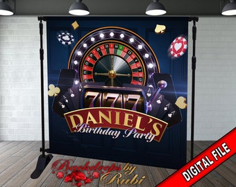 May include: A casino-themed backdrop featuring a roulette wheel, playing cards, and a slot machine with the number 777. The backdrop is dark blue with the text "DANIEL'S Birthday Party".