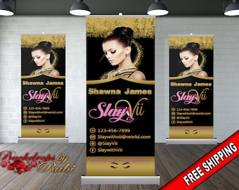 May include: A black and gold retractable banner with a woman's face and the text "Shawna James Slay with VII" and contact information. The banner has a gold glitter background and the text is in pink and white.