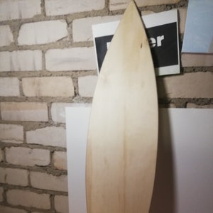Blank Canvas: Clear Unpainted Wooden Surfboard for DIY Projects Wall decor art