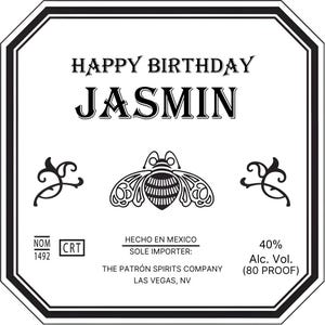 May include: Black and white birthday label with the text "HAPPY BIRTHDAY JASMIN". The label also features a stylized bee illustration and the text "NOM 1492 CRT", "HECHO EN MEXICO SOLE IMPORTER: THE PATRÓN SPIRITS COMPANY LAS VEGAS, NV", and "40% Alc. Vol. (80 PROOF)".