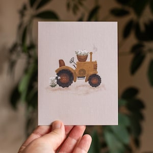 Greeting card with flowers and tractor