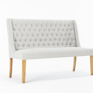 Padstow Upholstered large dining bench in easy-care fabric with solid oak legs