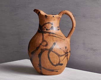 Barro chorreado pitcher made from unglazed native clay with oak resin pigment