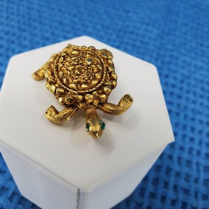 Vintage Turtle in Gold-Tone, beaded in Design with emerald green eyes.
