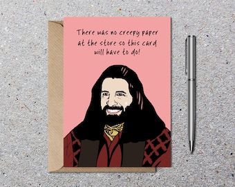 May include: A pink greeting card with a cartoon illustration of a man with a beard and long hair. The card has the text "There was no creepy paper at the store so this card will have to do!"
