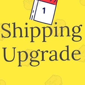 May include: A yellow background with a black and white calendar icon with the number 1 in red. The text "Shipping Upgrade" is in black.