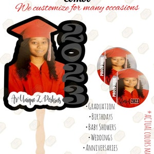 May include: A black and gray graduation fan with a red graduation cap and a photo of a person. The fan has the text "Av Unique L. Porkins" and "2023". Two round buttons with the text "Proud Mom" and a photo of a person are included. The text "Class of 2023" is on the button. The text "Graduation, Birthdays, Baby Showers, Weddings, Anniversaries, Momorial and More" is listed below the fan and buttons.