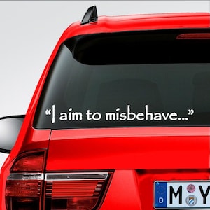 May include: A red car with a white vinyl decal on the back window that reads "I aim to misbehave..." The car has a German license plate that reads "MOY".