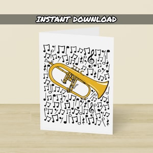 Peut inclure: Carte de vœux blanche avec une illustration de bugle jaune entourée de notes de musique noires. Les mots "INSTANT DOWNLOAD" sont imprimés en haut. La carte est posée sur une surface en bois brun clair.