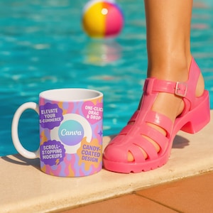 May include: A white ceramic mug with a colorful design featuring the text "Elevate Your E-commerce", "Canva", "Scroll-Stopping Mockups", "One-Click Drag & Drop", and "Candy-Coated Design".