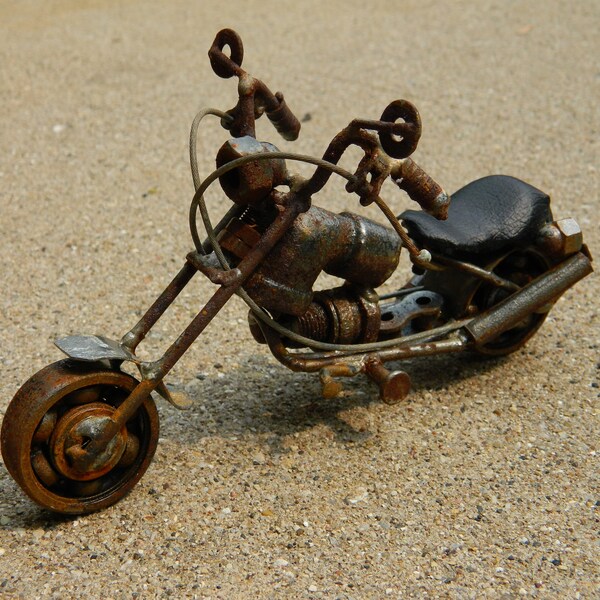 Vintage rat rod chopper motorcycle model nuts bolts brutalist sculpture recycled welded rusty junk salvage scrap metal art Harley Davidson