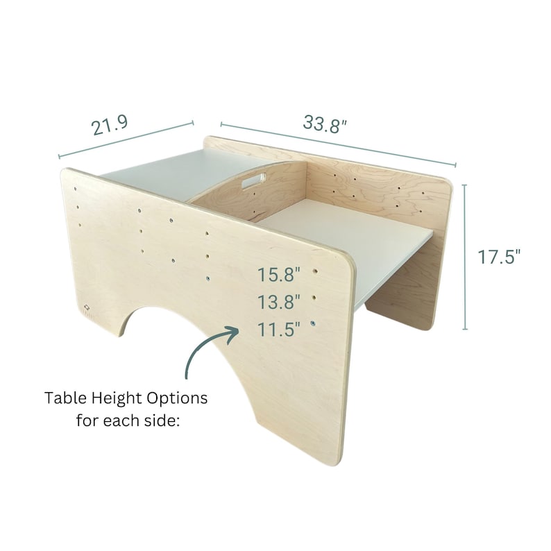 May include: A wooden table with a curved top and adjustable height options. The table is 33.8 inches wide, 17.5 inches tall, and 21.9 inches deep. The table height options are 15.8 inches, 13.8 inches, and 11.5 inches.