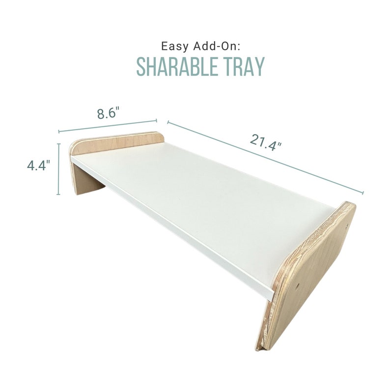May include: A white and wood desktop tray with rounded edges. The tray measures 21.4 inches long, 8.6 inches wide, and 4.4 inches high. Easy Add-On: Sharable Tray