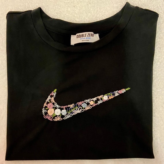 floral nike swoosh