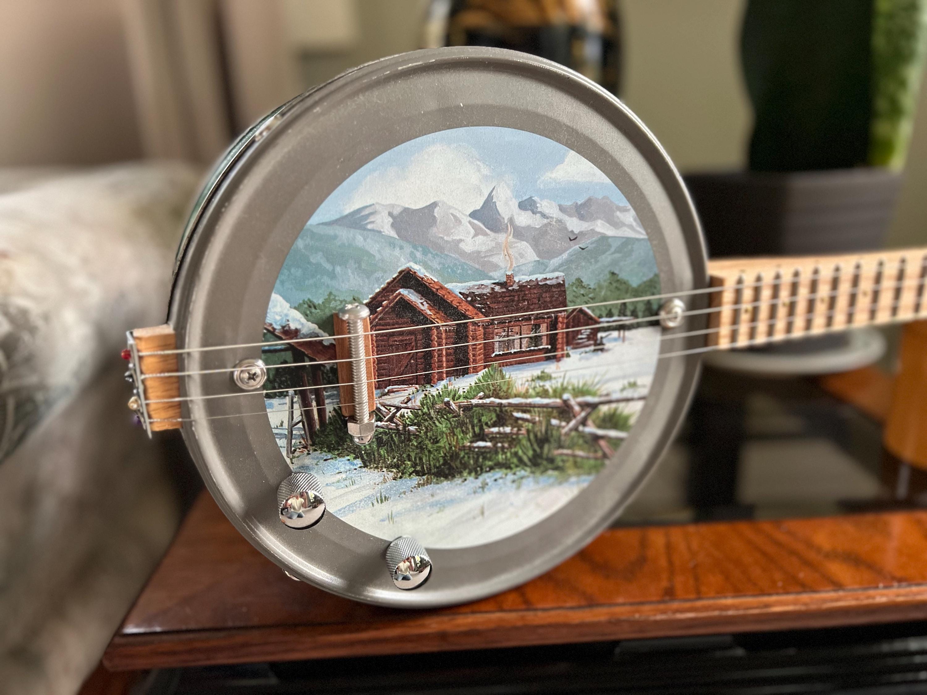 JonBoy Snowy Cabin 4 String Can Guitar