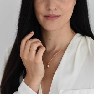 Handmade and dainty jewelry made in Montreal by Piper & Pearl Jewelry. Feminine, modern and delicate, perfect for a gift for her. Collections of costume, vermeil and fine jewelry. Delicate vermeil gold chevron wishbone ring.