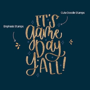 May include: A navy blue background with gold glitter text that reads "IT'S Game Day y'all!". The text is surrounded by small blue and gold accents. The image is labeled "Emphasis Stamps" and "Cute Doodle Stamps".